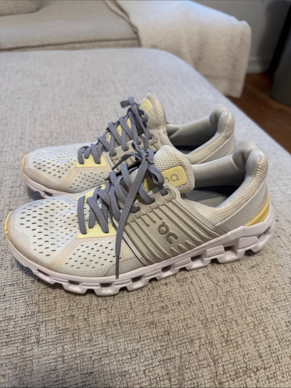 On Running Women's Sneakers in Light Gray with Pale Yellow Accents